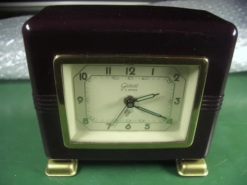 Art Deco Goldbühl Tischuhr Wecker mit Spieluhr und Spardose
