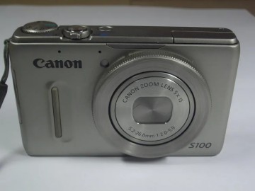 Canon PowerShot S100 Digitalkamera mit 1 Akku und Ladegerät