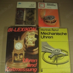 4 alte Bücher über Uhren